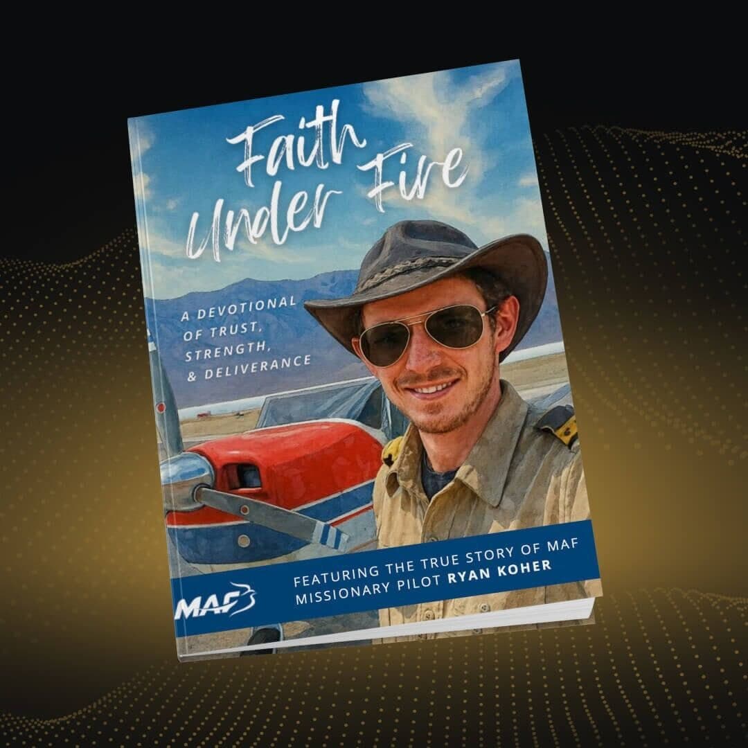 The cover of Faith Under Fire, a devotional from Mission Aviation Fellowship.